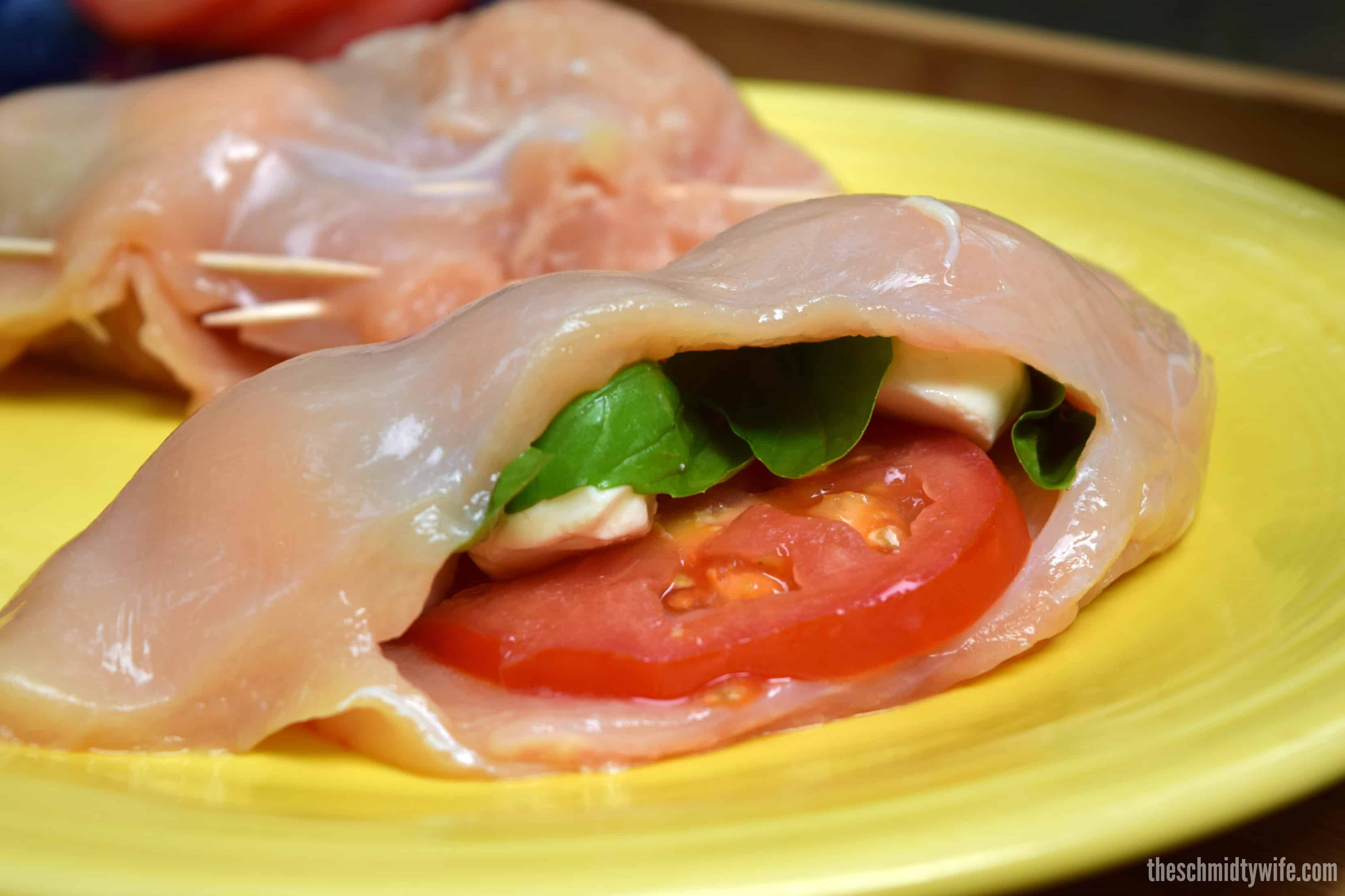 Chicken breast stuffed with tomato, mozzarella, and basil