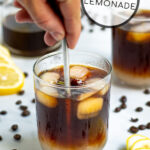 Pinterest Pin showing a glass where lemonade and cold brew coffee are being stirred together