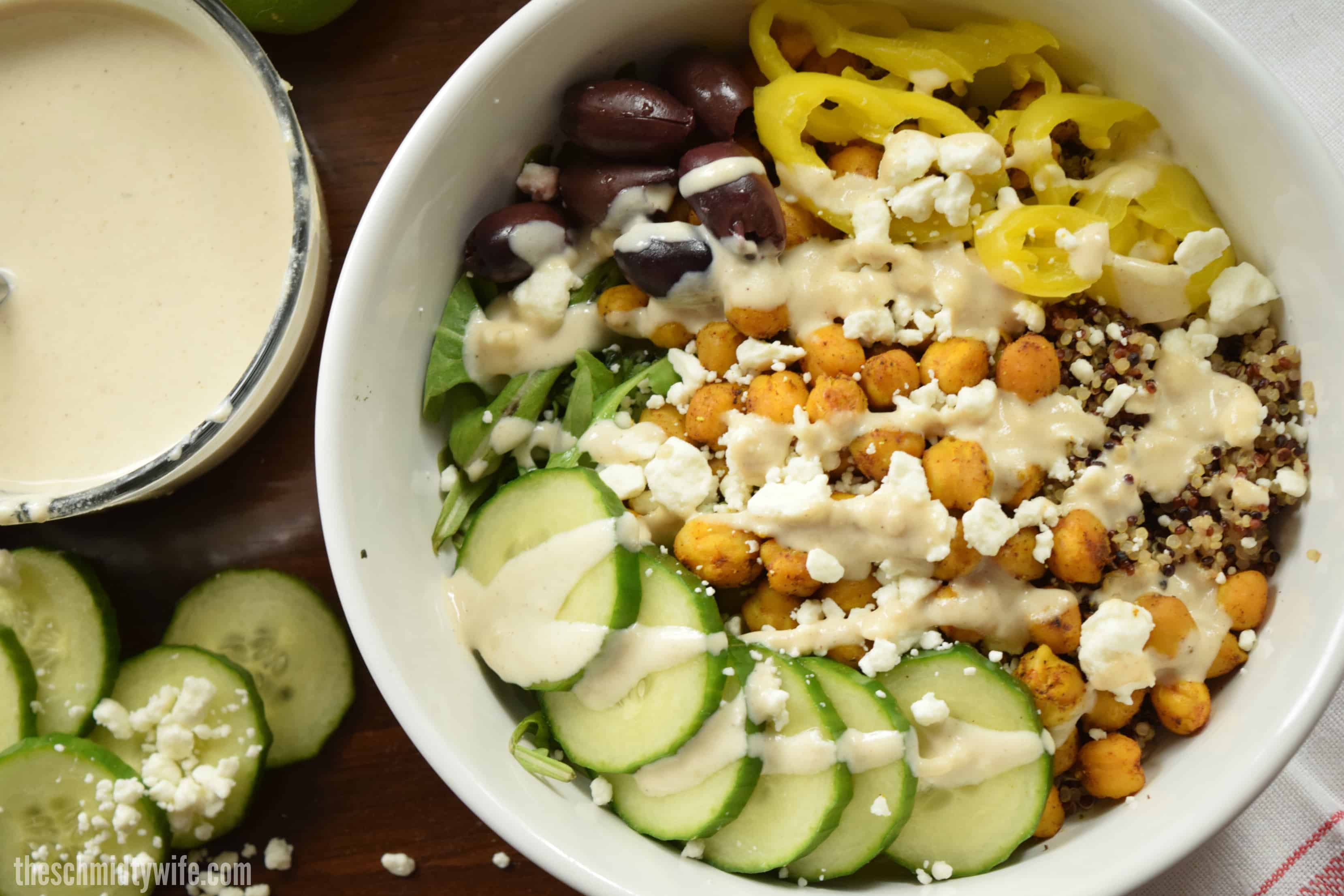 large white bowl containing a chickpea shawarma buddha bowl ready to eat