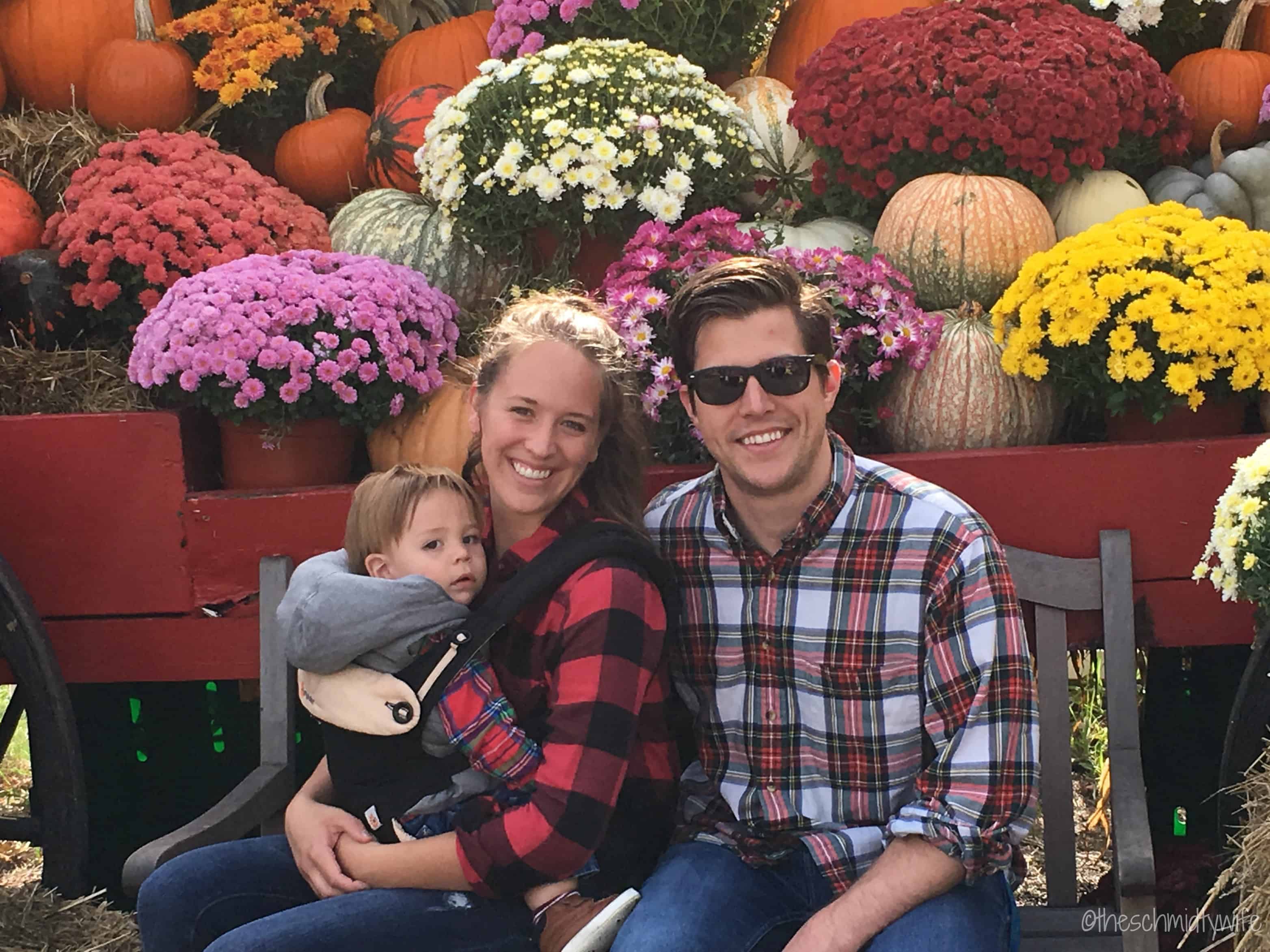 family sitting on bench