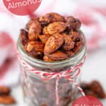 sweet and spicy candied almonds in a jar with a bow, make a great gift