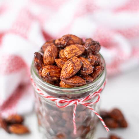 almonds in a jar with a red bow