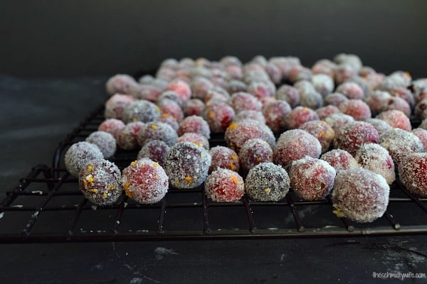 close up of Orange Zest Sugared Cranberries on a wire rack