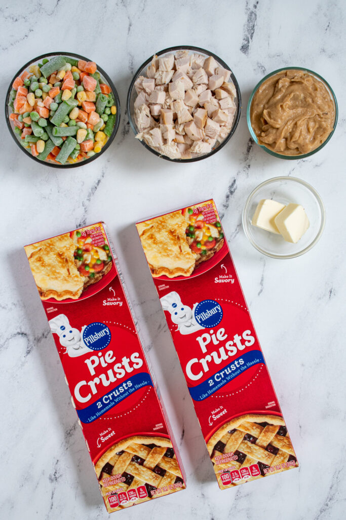 All the ingredients need to make Mini Leftover Turkey Pot Pies laid out on a tabletop.