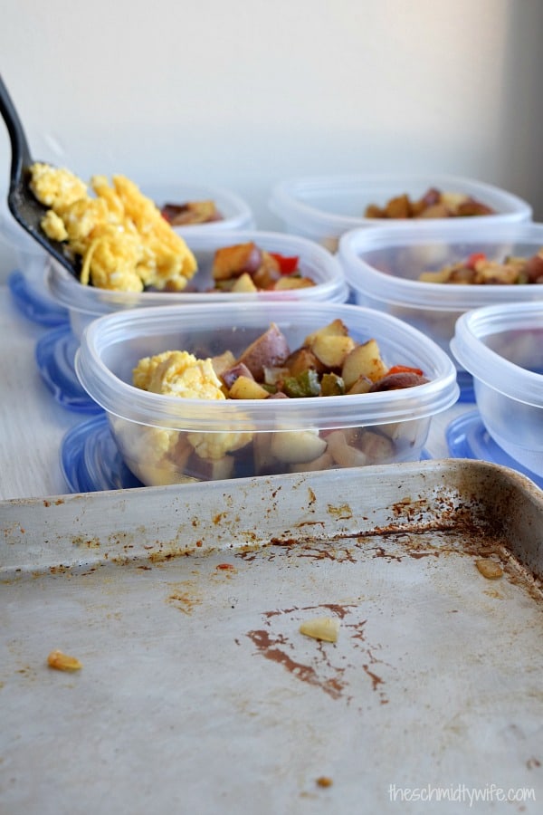 eggs being placed into the meal prep container