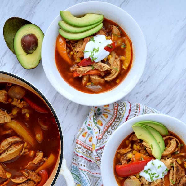 2 bowls and a pot of Chicken Fajita Soup
