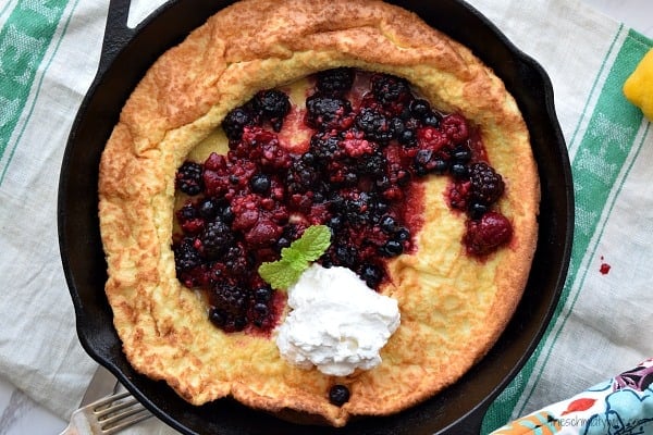 Lemon Dutch Baby with Berry Compote and Whipped Cream