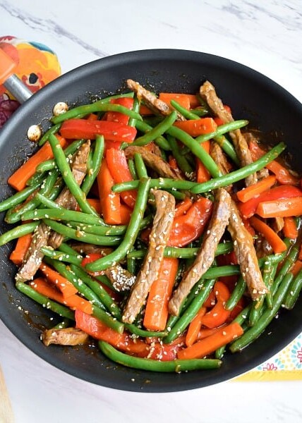 Orange Ginger Beef Stir Fry in a skillet