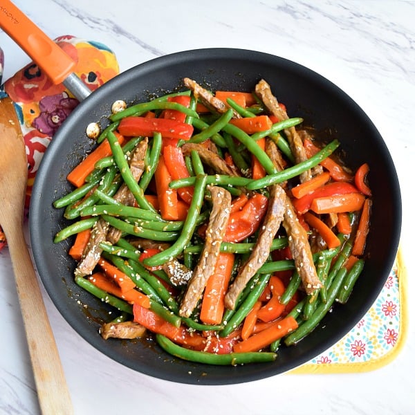 Orange Ginger Beef Stir Fry in a skillet