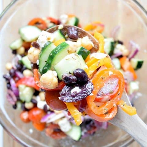 Two Bean Mediterranean Salad up close on a spoon