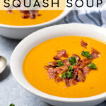 Pinterest Pin with text overlay, Roasted Butternut Squash Soup, image of close up of a white bowl of soup topped with bacon crumbles and parsley.