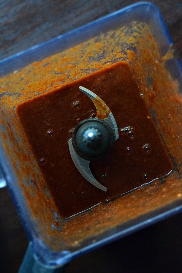 freshly blended enchilada sauce in the blender