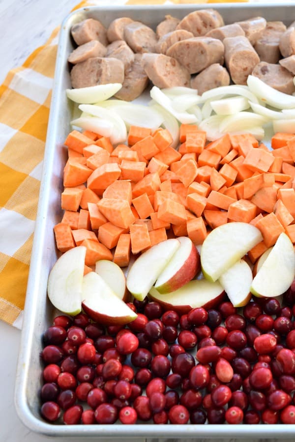 Close up of colorful uncooked Sheet Pan Cranberry Chicken Sausage