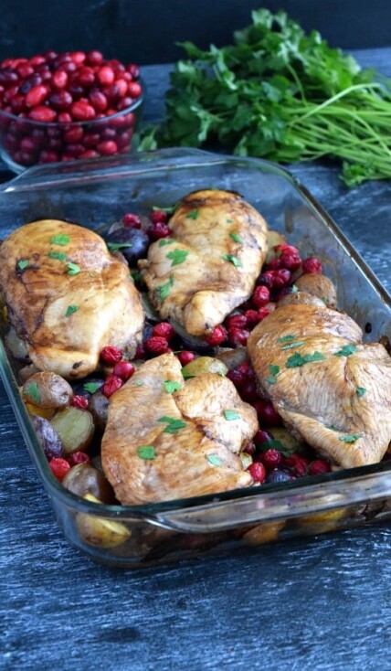 Side view of cooked balsamic cranberry chicken bake
