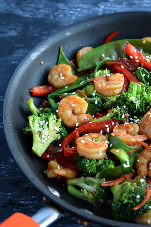 skillet filled with cooked shrimp stir fry