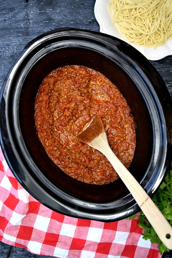 overhead shot of crockpot full of bolognese sauce 