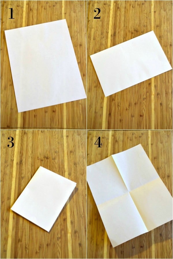 a piece of paper being folded into 4ths