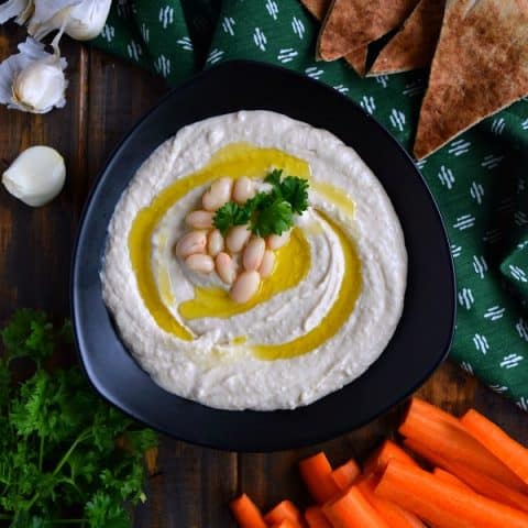 Roasted Garlic White Bean Hummus is extremely creamy and easy to make using just 5 ingredients