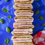 stack of pressed sandwiches on a blue background
