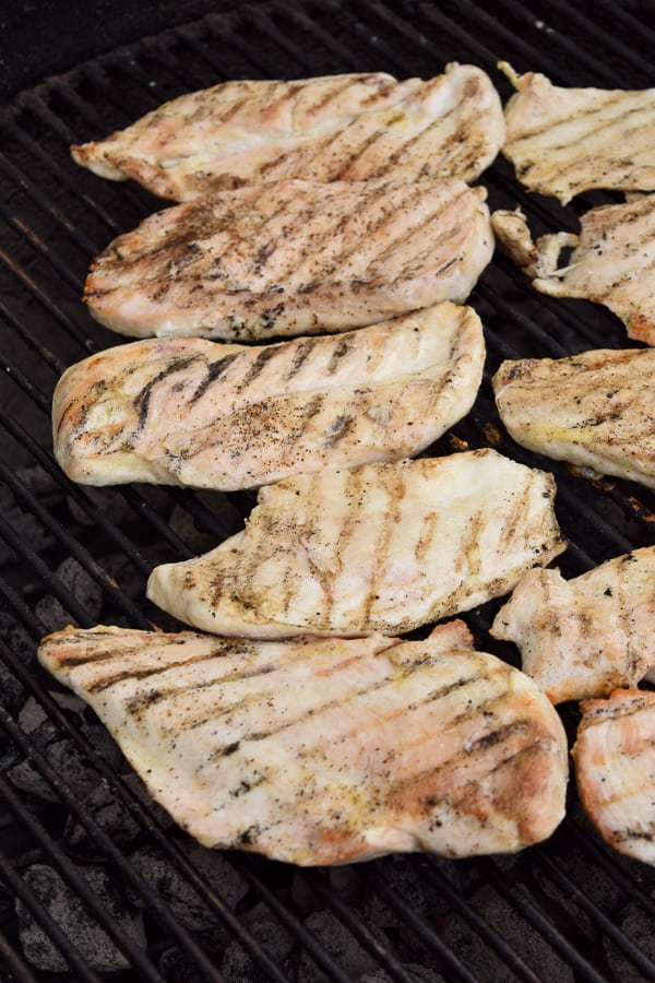 Chicken breasts on a charcoal grill