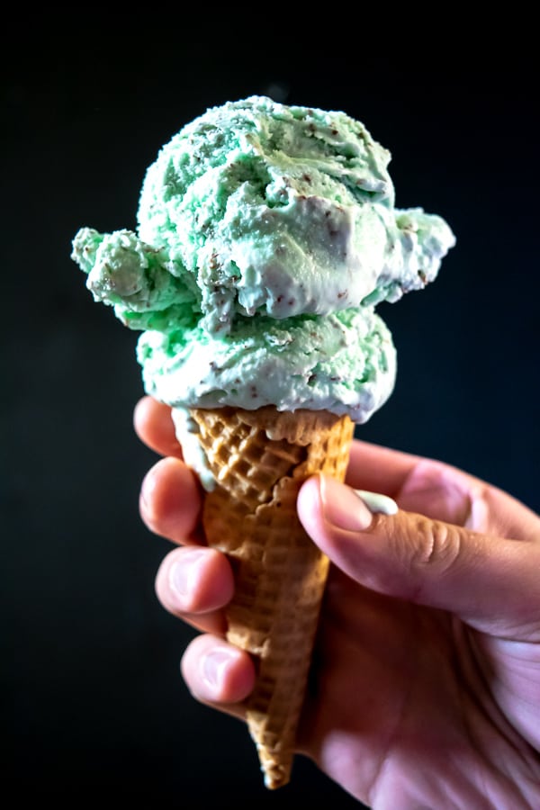 A cone full of homemade Mint Chocolate Chip Ice Cream