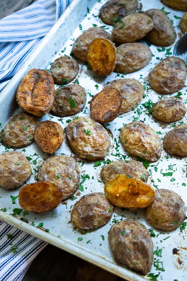 A tray of Crispy Oven Roasted Baby Yukon Potatoes ready to eat