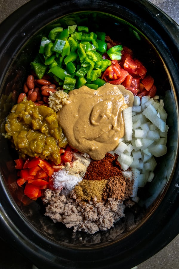 Secret Ingredient Turkey Chili Ingredients in the slow cooker before cooking