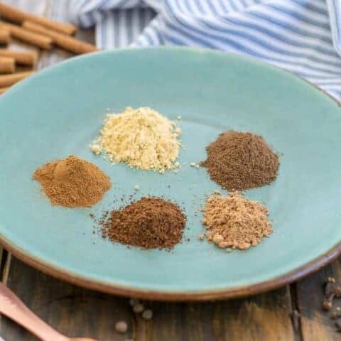 5 spices on a plate to make gingerbread spice