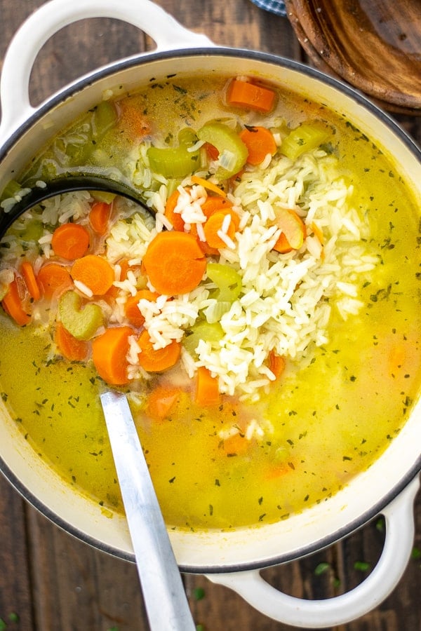 close up of a pot full of simple vegetable rice soup