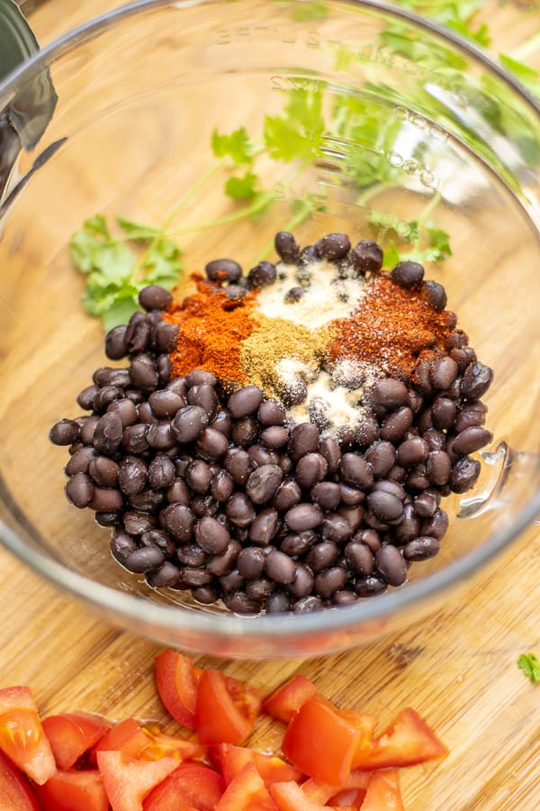 ingredients for the nachos, black beans with spices