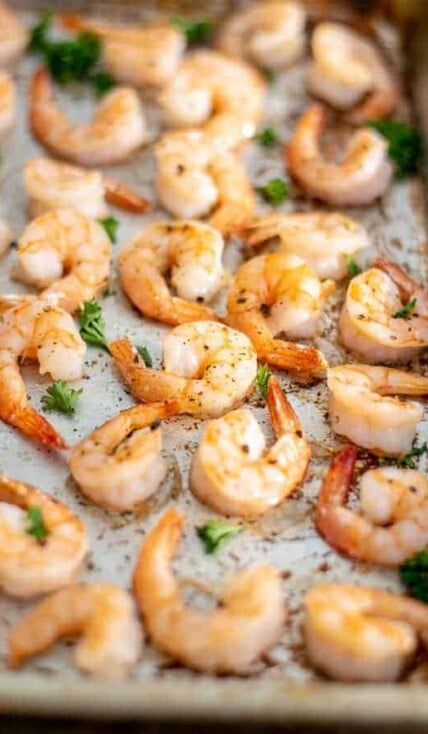 close up of oven baked shrimp recipe on a sheet pan