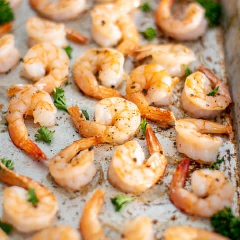 close up of oven baked shrimp recipe on a sheet pan