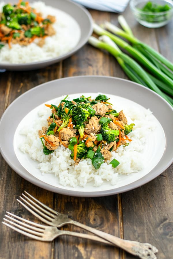 plate full of rice and ground pork stir fry