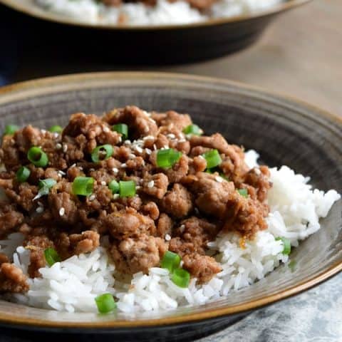 a bowl of Korean Ground Turkey over a bowl of rice