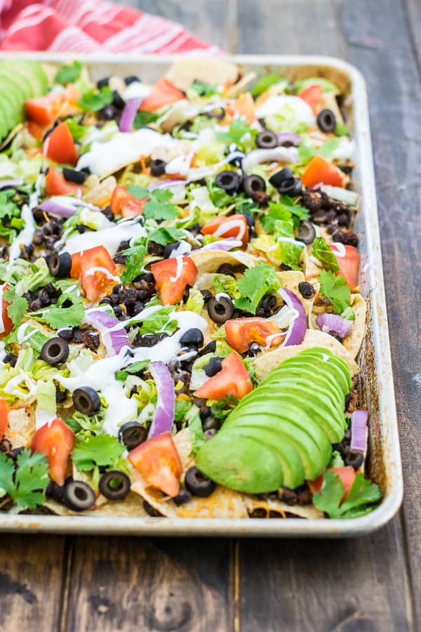 black bean nachos recipe on a sheet pan ready to eat