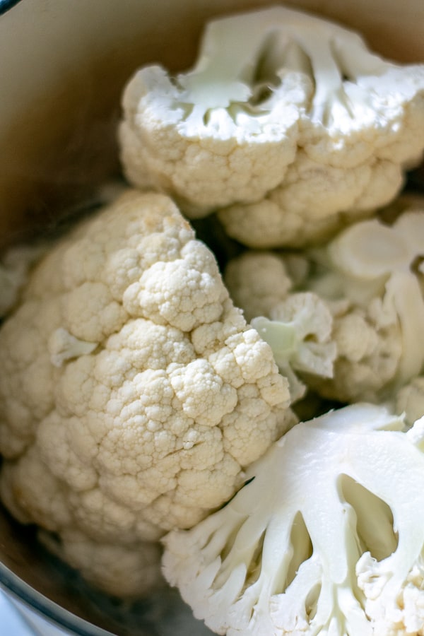 quartered cauliflower in the pot
