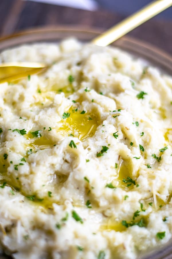 close up of buttery garlic parmesan mashed cauliflower
