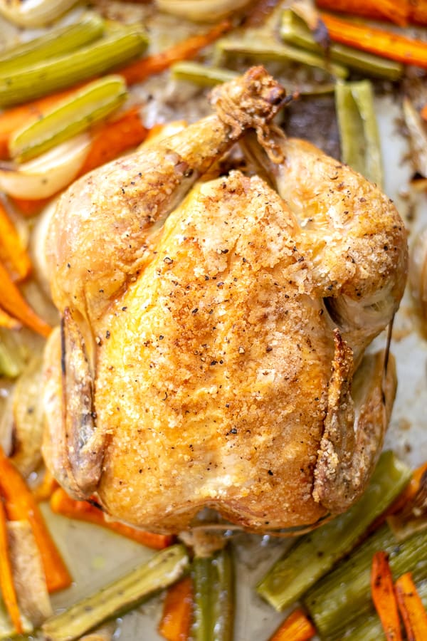 cooked chicken fresh out of the oven on a sheet pan