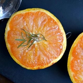 view of a grapefruit cut in half broiled with honey