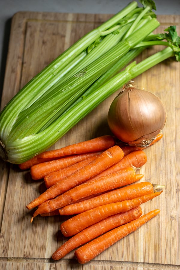 ingredients for the vegetables, carrots, celery, and an onion