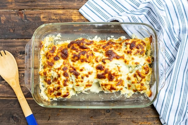 spinach artichoke chicken bake in a 9x13 dish