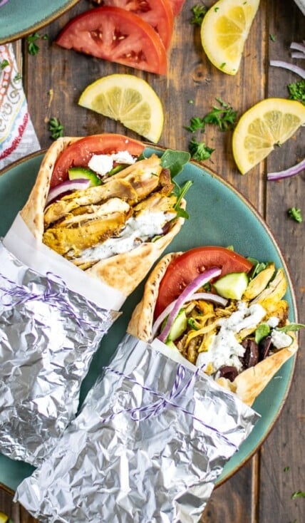 two chicken shawarma wraps on a plate