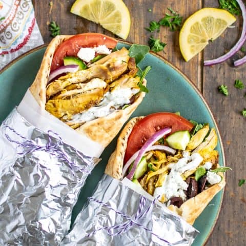 two chicken shawarma wraps on a plate