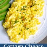 cottage cheese scrambled eggs with salt, pepper, and parsley on a white plate