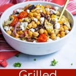 grilled chickpea salad in a white bowl on a table