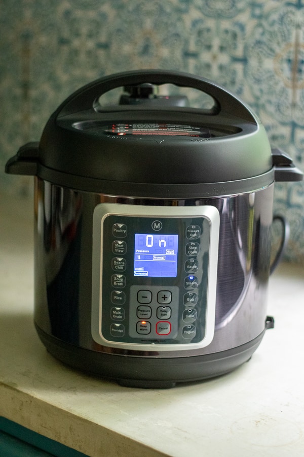 Mealthy mulitpot sitting on the counter turned ON