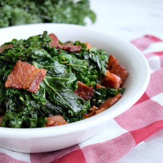 bowl full of sauteed kale and bacon pieces