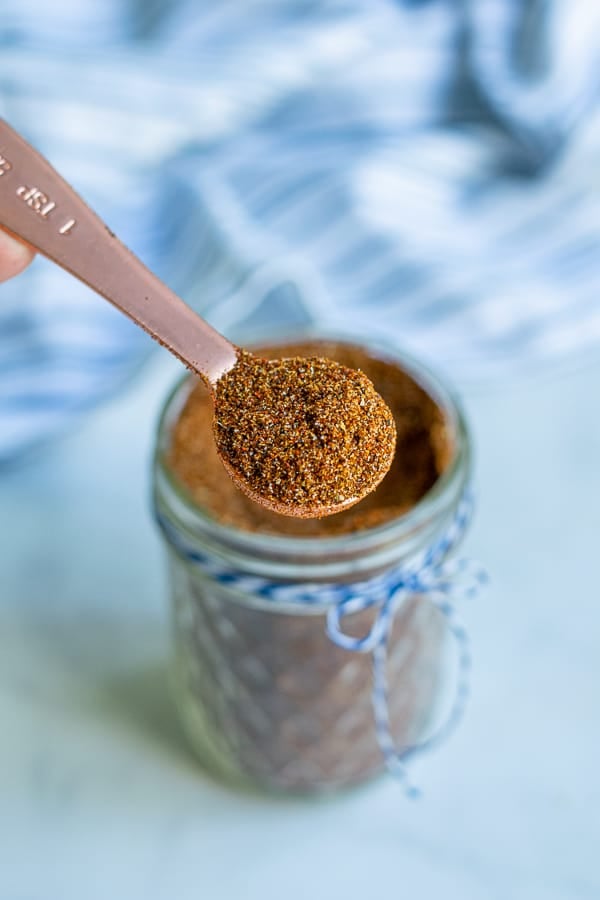 spoon full of taco seasoning blend from a jar