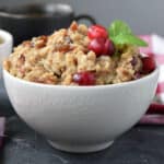 white bowl of cranberry date oatmeal