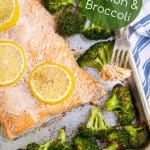 sheet pan salmon and broccoli with a bite on a fork